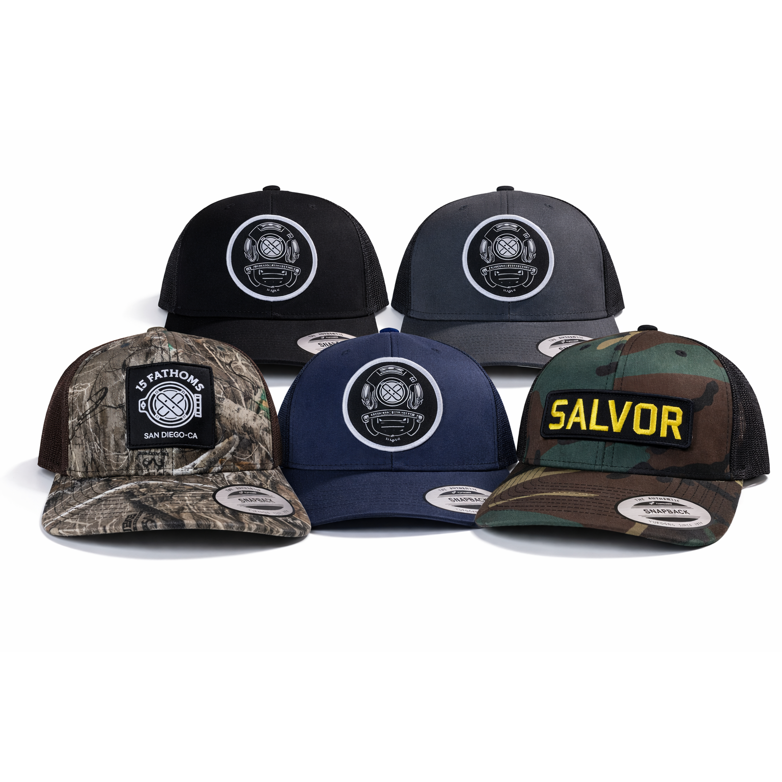 Five snapbacks with different 15 Fathoms designs and colors on a white background