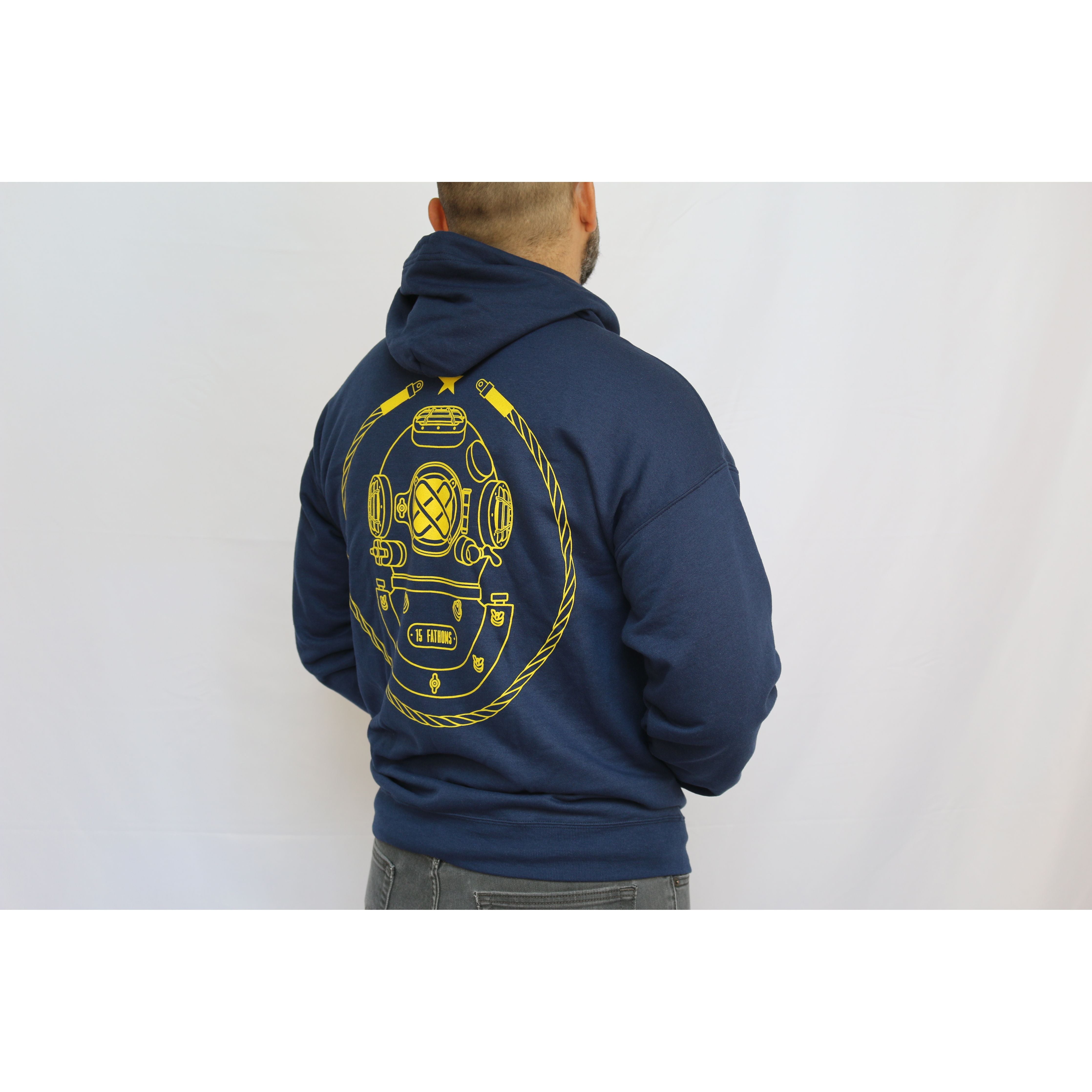 Iconic Hoodie - navy hoodie with gold diver helmet logo on the back, angle view