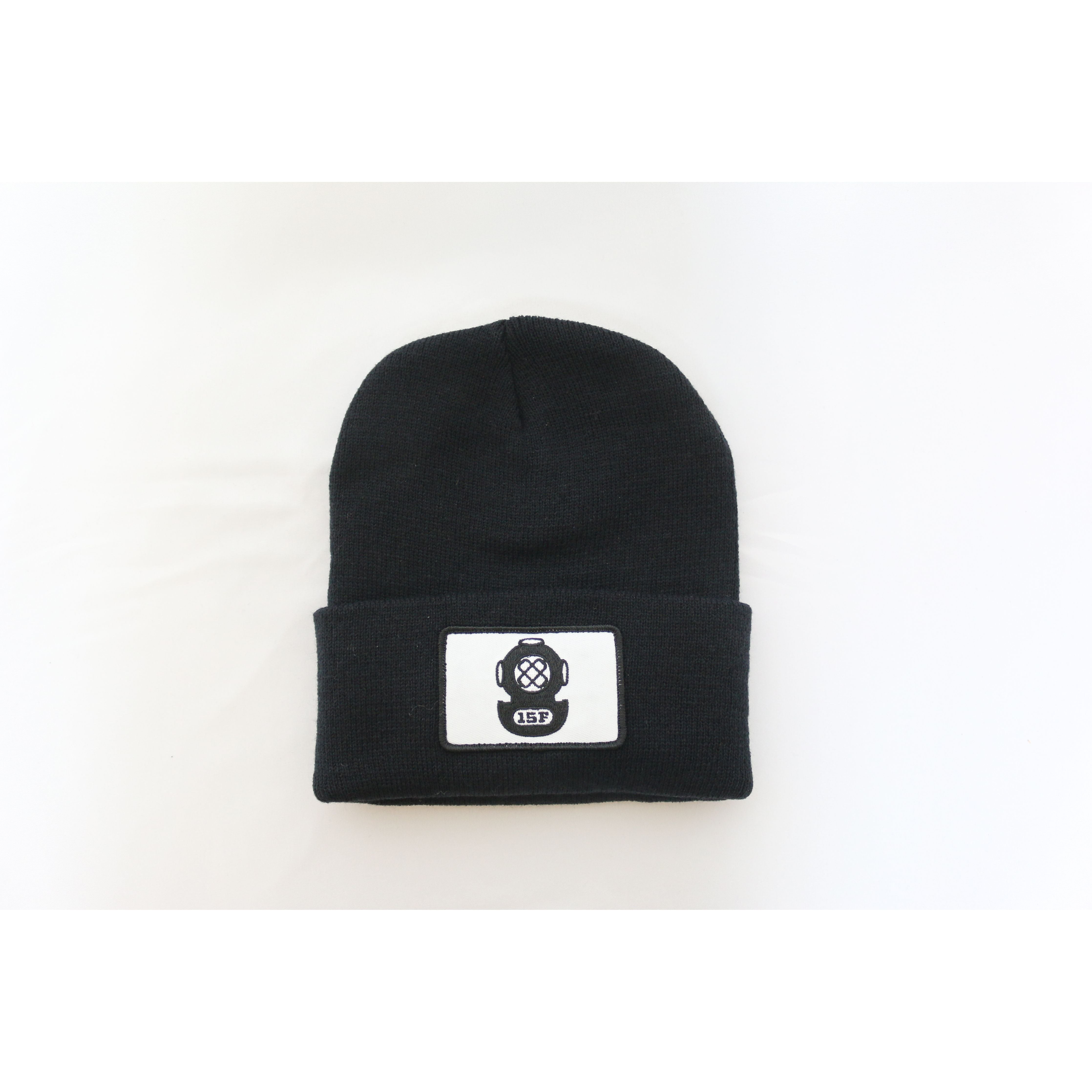The Watch Cap - black beanie with diver helmet logo on front on white background