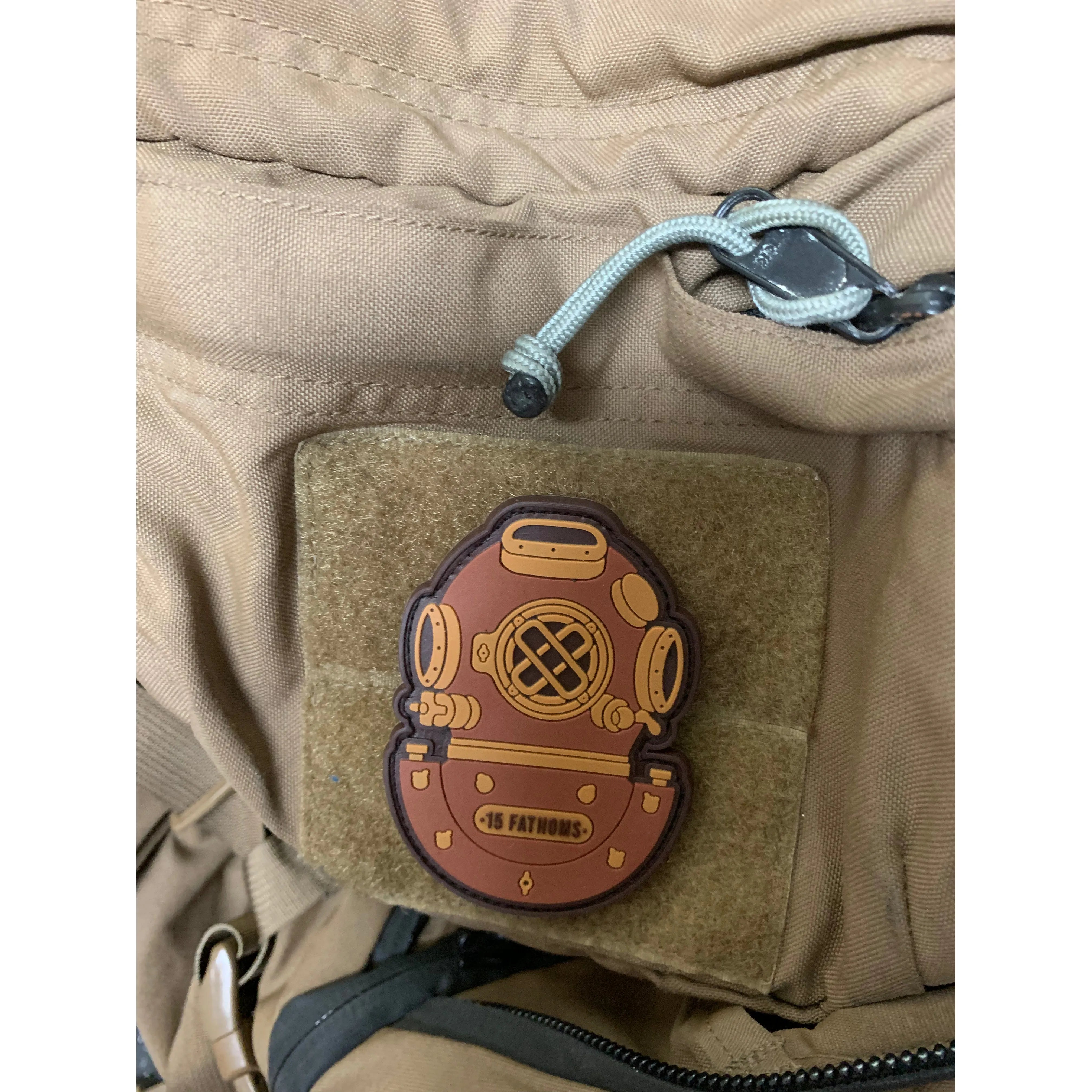 Mark-5 Patch - dive helmet with “15 Fathoms” text on base of helmet, made from PVC with velcro backing, placed on velcro bag