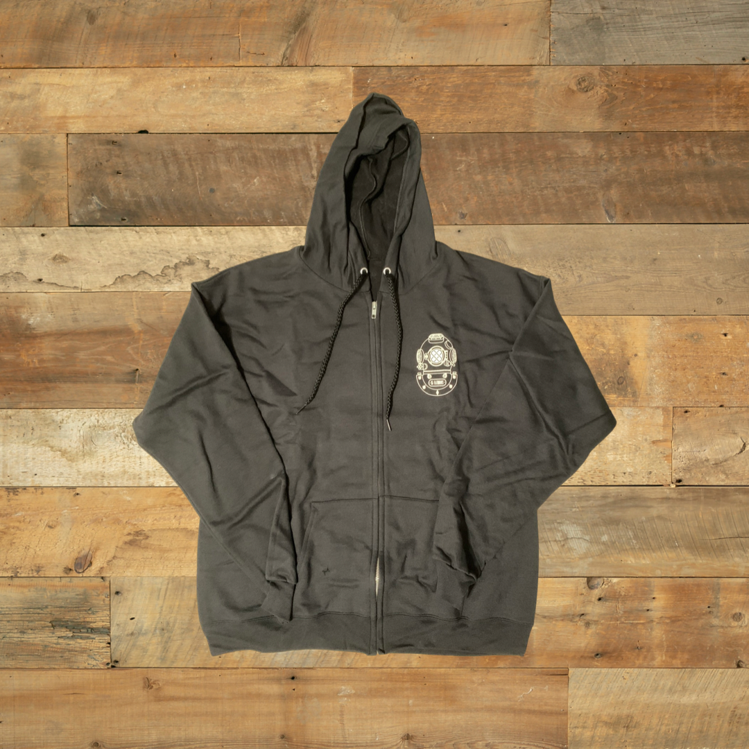 Iconic Hoodie - black zip hoodie with white diver helmet logo on the heart front on wooden background