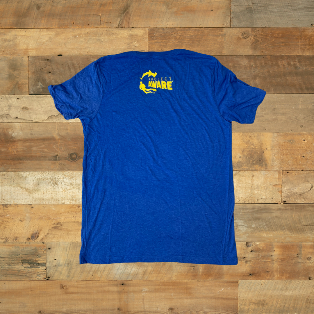 Project Aware Iconic - blue t-shirt with project aware logo on back on wooden background