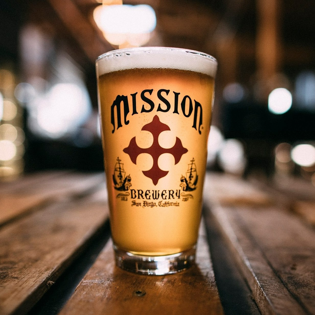 Mission Brewery pint glass full of beer