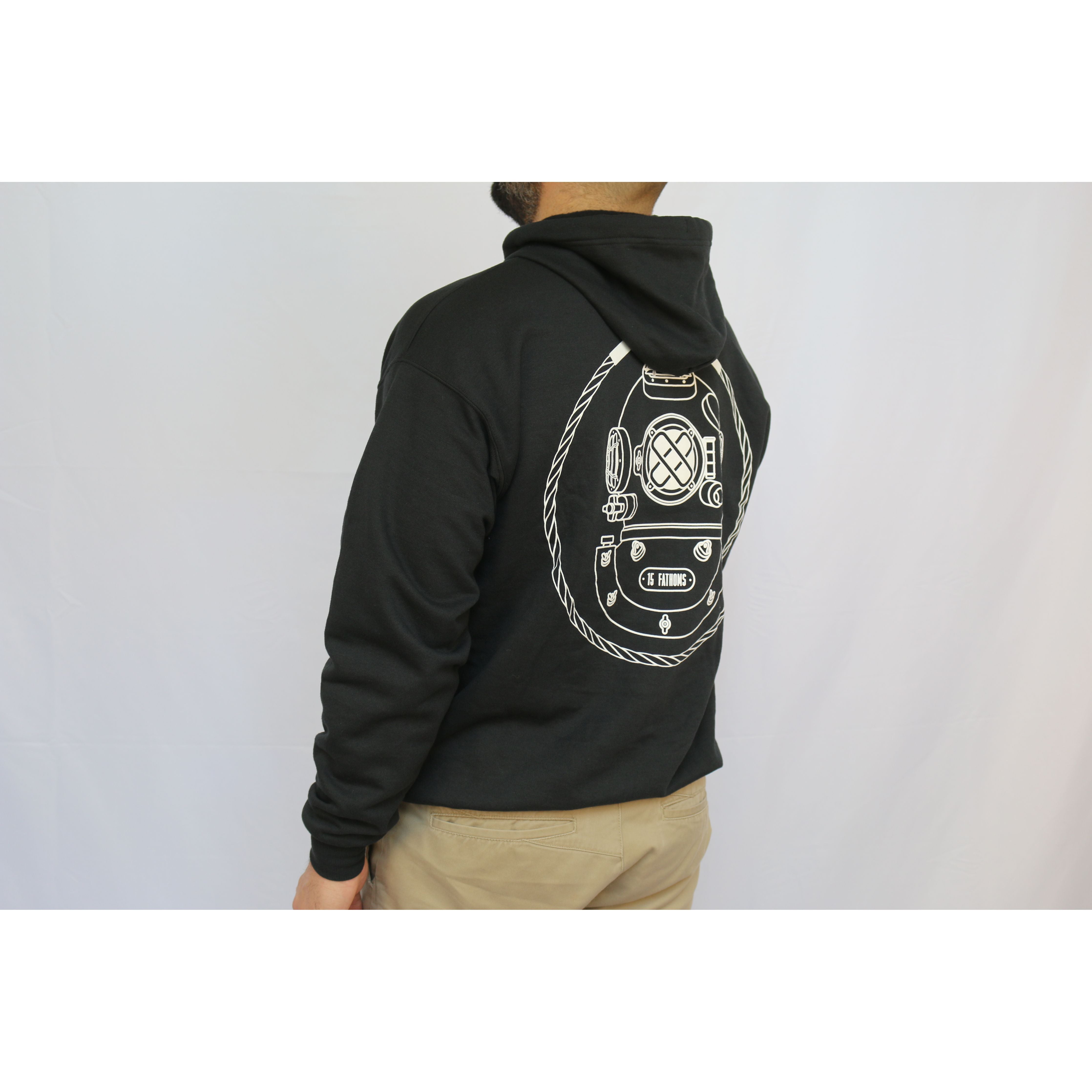 Iconic Hoodie - black hoodie with white diver helmet logo on the back, angle view