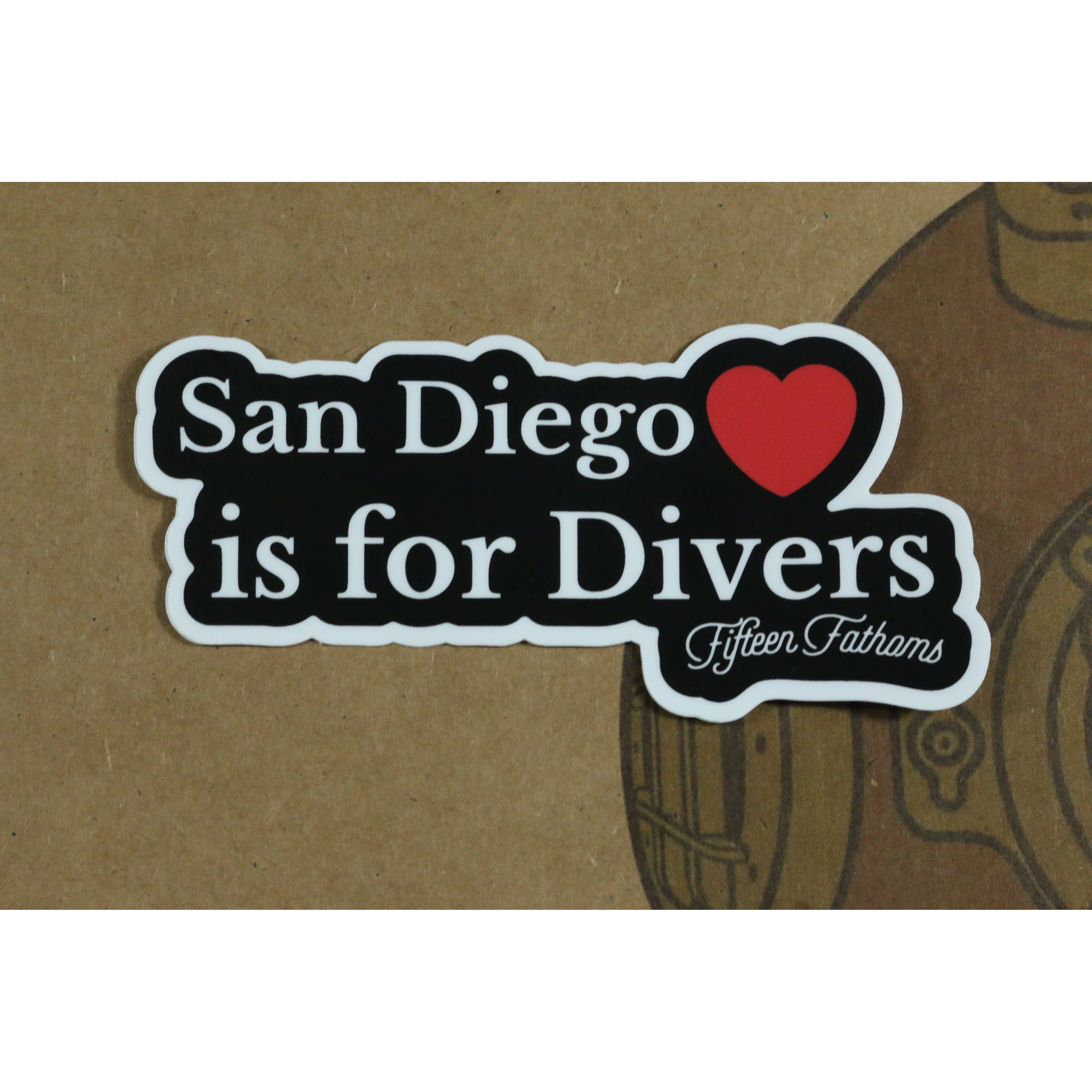 San Diego is for Divers Sticker on a surface with diver helmet logo background