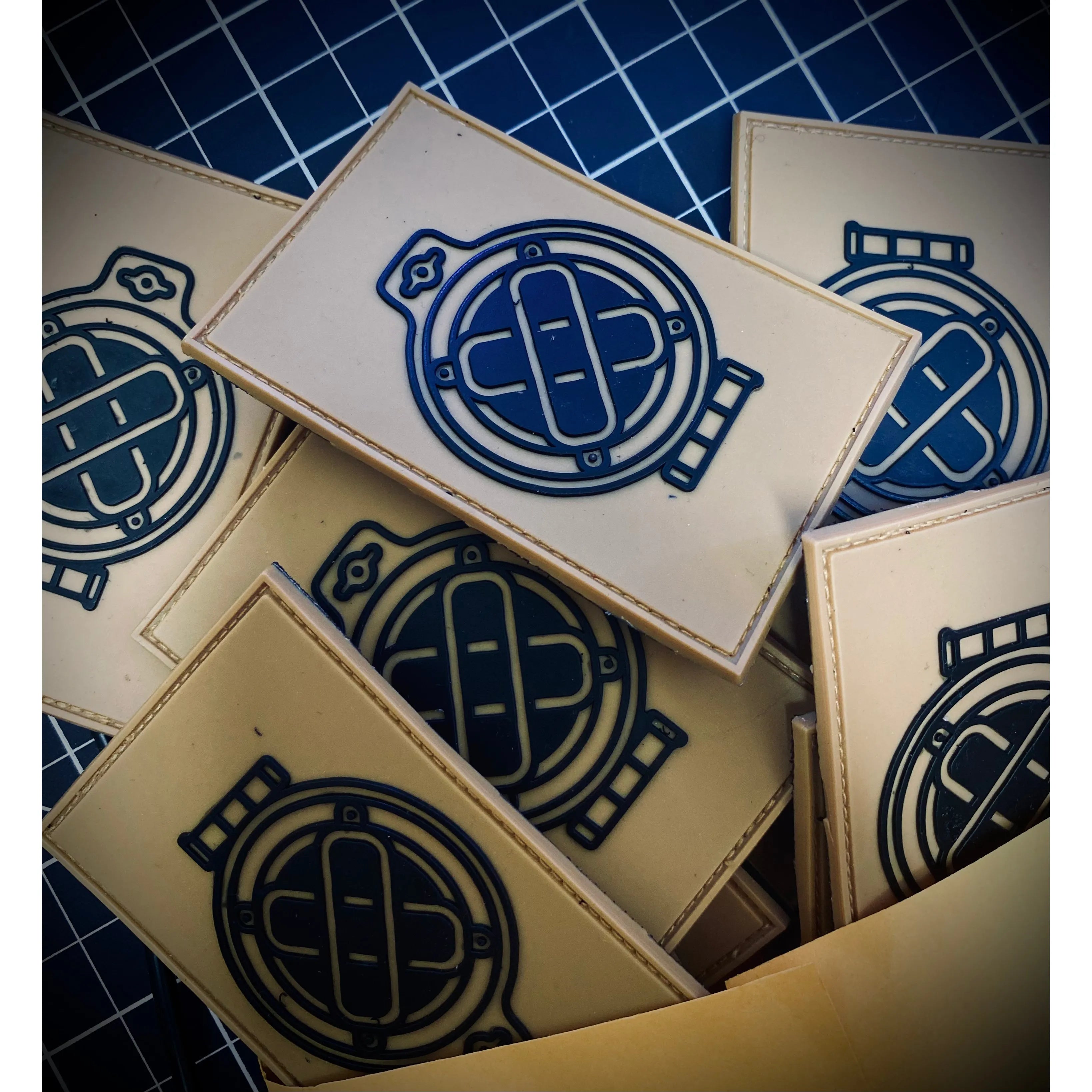 MK-5 Faceplate Patch - pile of faceplate patches made from PVC with velcro backing