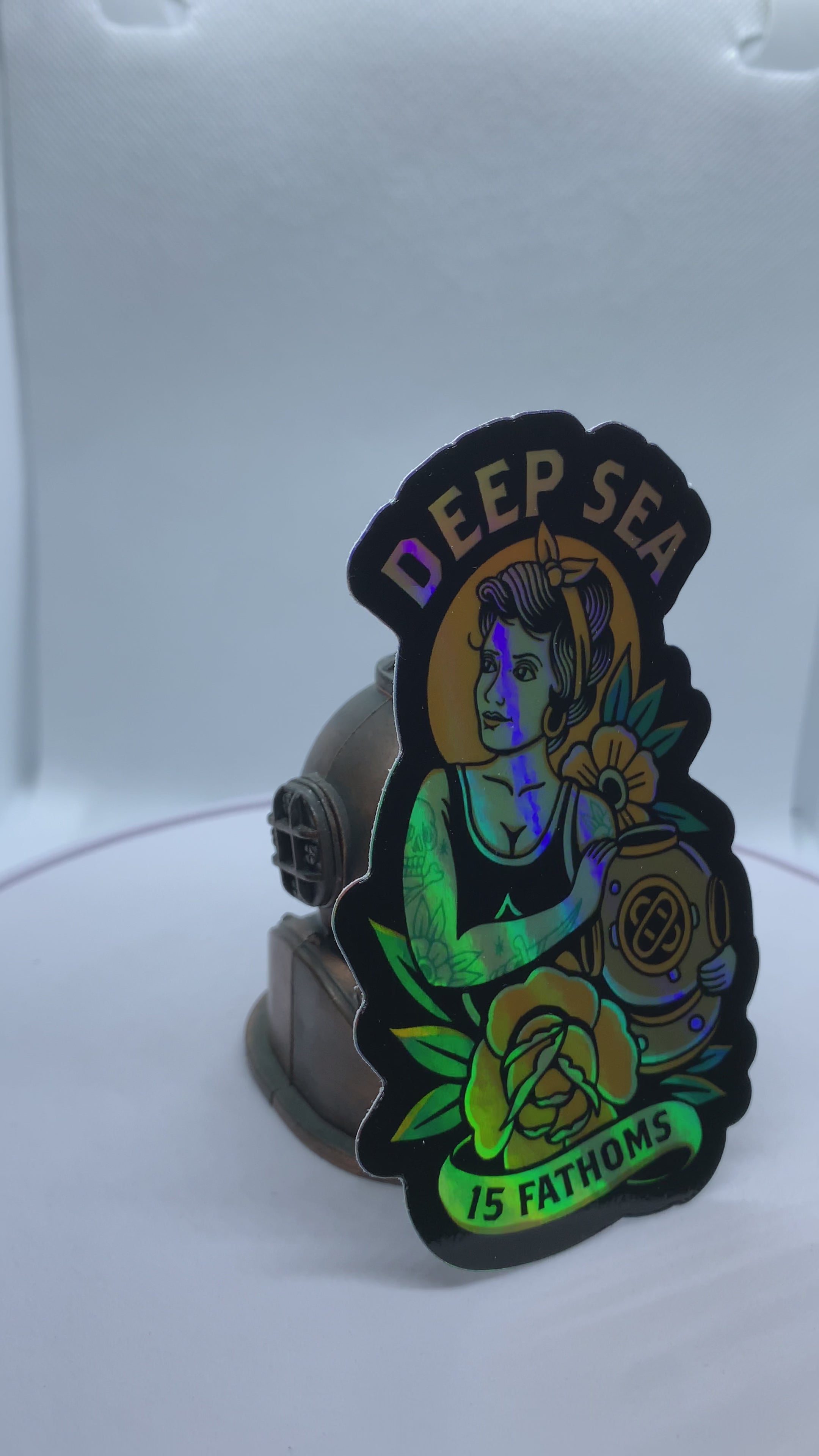 Holographic Diver Daisy - video of sticker rotating to show colorful holographic shine