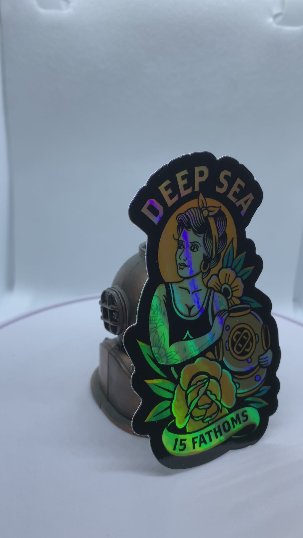Holographic Diver Daisy - video of sticker rotating to show colorful holographic shine